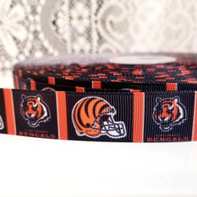 Load image into Gallery viewer, 7/8" Cincinnati Bengals Grosgrain Ribbon. NFL Football Sports Ribbon.  Bengals Helmet