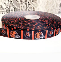 Load image into Gallery viewer, 7/8" Cincinnati Bengals Grosgrain Ribbon. NFL Football Sports Ribbon.  Bengals Helmet
