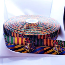 Load image into Gallery viewer, Magic Crest Grosgrain Ribbon. Magic Party Ribbon. Pictures don&#39;t give this ribbon justice comes in 5/8&quot; 7/8&quot; and 1.5&quot;
